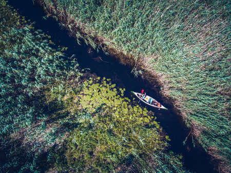 Discovering Danube Delta in a Canoe aerial viewの写真素材