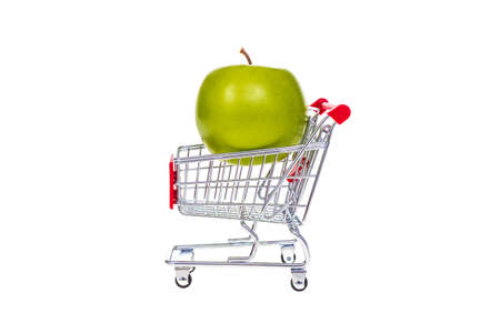 Apple in shopping cart isolated on white backgroundの写真素材