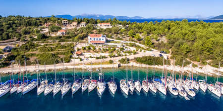 Yachts ancored in bay at Fiskardo Kefalonia Greeceの写真素材
