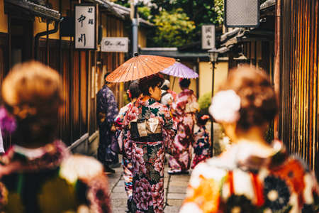 Kyoto, Japan, October 2017: Women in traditional japanese kimonos walking in Kyoto, Japanのeditorial素材