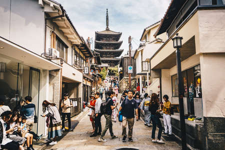 Kyoto, Japan, October 2017: People walking on the streets of Kyoto, Higashiyama District, Japan. Yasaka Pagoda and Sannen Zaka Street visibleのeditorial素材