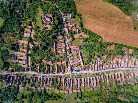 Saxon Village Viscri in Transylvania, Romania. Aerial view from a droneの写真素材