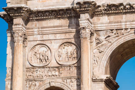 Detail of the Arch of Constantine near the Roman Colosseum, landmark and symbol of Rome, Italyの写真素材