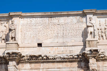Detail of the Arch of Constantine near the Roman Colosseum, landmark and symbol of Rome, Italyの写真素材
