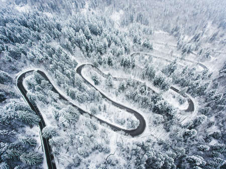 Extreme Winter Weather on a winding road in the mountains