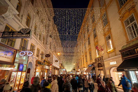 Vienna, Austria - December 2017: Herrengasse busiest commercial street decorated for Christmas and holidaysのeditorial素材