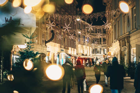 Graz, Austria - December 2017: Graz city streets advent Christmas decorations by night. Shot between...