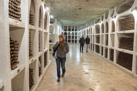 Cricova, Moldova - November 2018: Tourists visiting the National Wine Gallery inside the underground...