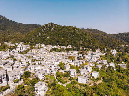 Aerial view of Panagia town in Thasos Island with traditional greek white houses and stone roofの写真素材