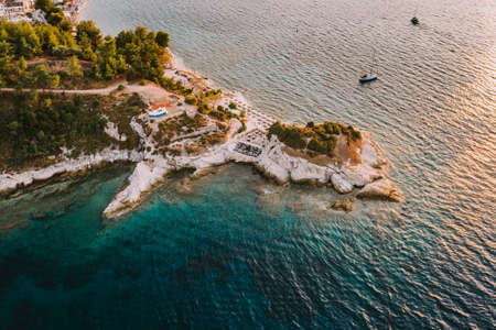 Sunset in Thassos Greece on the Karnagio Beach near Thassos (Limenas) townの写真素材