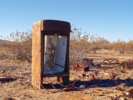 The remains of an abandoned refrigerator that was dumped in the Arizona desert so long ago that it is now just a rusted piece of junk. Located near Arlington Arizona.の写真素材