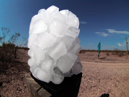 A conglomeration of ice cubes sitting in the hot Arizona sun to see how long it takes for them to melt.の写真素材