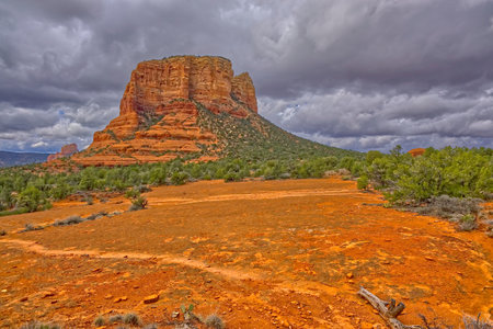 View of Courthouse Butte from a sandstone plateau along a trail that leads to the Rabbit Ears in Sedona.の写真素材