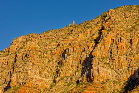 The historic Desert View Watch Tower on the south rim of the Grand Canyon viewed from the Tanner Trail 1600 feet below the tower location.の写真素材