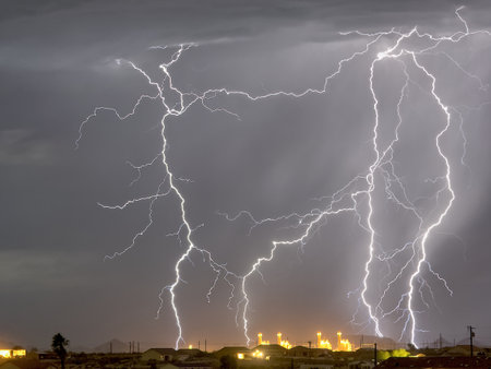 Lightning striking near a power plant in Arlington AZ during the 2016 monsoon season.