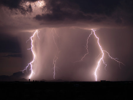 Lightning striking in the Gila bend Mountains during the 2006 Arizona Monsoon.の写真素材