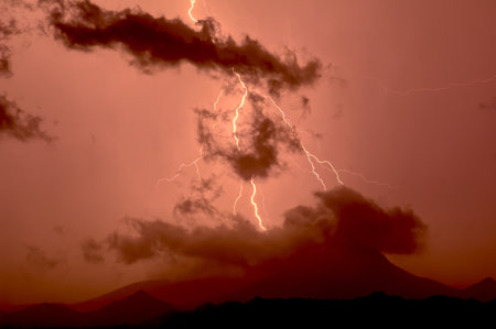 Woolsey Peak in the Gila Bend Mountains of Arizona enshrouded by a dust laden cloud during the 2014...
