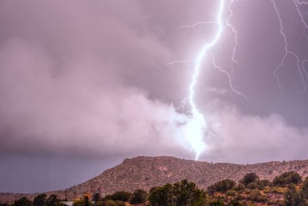 Massive lightning bolt striking the south end of Sullivan Butte during a May 6th 2025 thunderstorm...