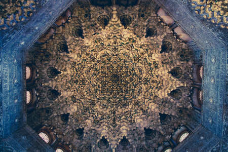 Ceiling with intricate sculpted details of moorish arabian origin / influence, astonishing level of patterns.Ancient beautiful moorish stucco work, Granada, Spainのeditorial素材