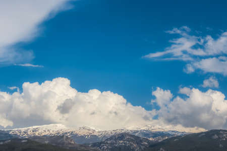 Beautiful view of snowy mountains in Sierra Nevada, Granada, Spain. Highest point of continental...