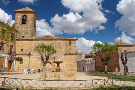 Courtyard in front of the Church of San Pedro (Iglesia de San Pedro) with a water fountain in the center, Ubeda, Spainのeditorial素材