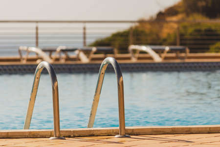 Swimming Pool Ladders, Steps at Dona Ana Beach Lagos, Portugalの写真素材