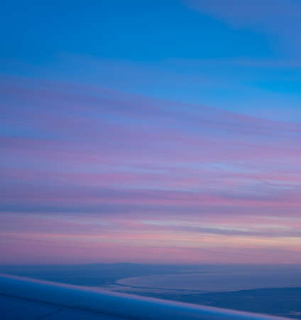 View of Comporta, troia, Setubal bay, near Lisbon, Portugal. Aerial perspective from a plane. Soft sunset lights, with pink, pinkish tone/hue.の写真素材