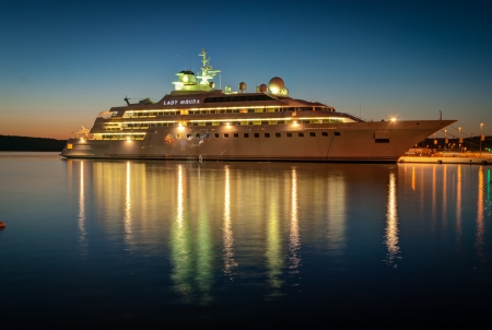 Modern cruise liner in the harbor at nightのeditorial素材