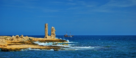 Ruins of a fortress - arch over seashore, Mahdia, Tunisia の写真素材