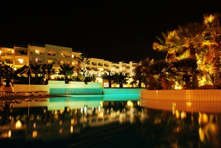 Swimming pool at night in exclusive hotel-Mahdia,Tunisia. のeditorial素材