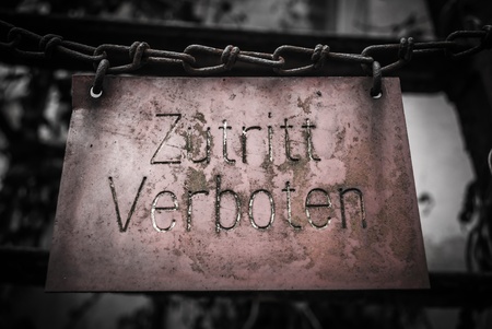 No trespassing signs  Zutritt verboten   hanging on chain の写真素材