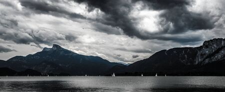 Clouds above lake Mondsee before a storm  Salzkammergut, Austria の写真素材