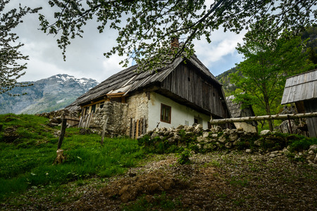 Traditional Slovenian house in the mountains village in spring の写真素材