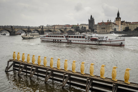  Photo of yellow penguins-lights on Vltava river in Prague,Czech Republic の写真素材