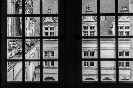 Monochrome photo of old architecture-view from windowの写真素材