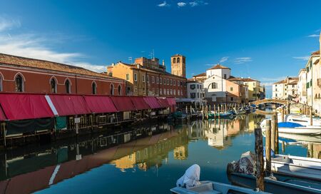 Canal at the old town of Chioggia - Italy.の写真素材