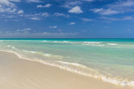 Cuba. Exotic beach nature and clouds on horizon. Summer beach paradise.の写真素材