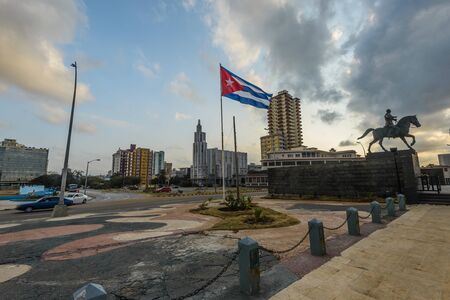 A Cuban flag in the middle of the square in Havana.の写真素材