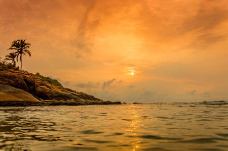 sunset at Kovalam beach, Kerala, Indiaの写真素材