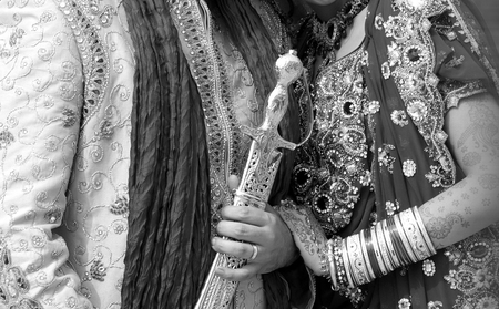 Details of groom's and bride's wear at the punjabi wedding, indian wedding accessoriesの写真素材