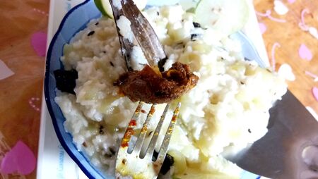 Aujhi is a vegetarian meal recipe from uttarpradesh. White rice with bottle gourd and pickleの写真素材