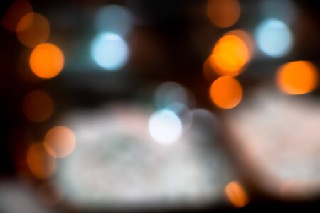 Light abstract bokeh background by blur or defocused at light element use for background or wallpaper in new year diwali christmas marriage celebrationの写真素材