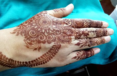 Popular Mehndi Designs for Hands or Hands painted with Mehandi Indian traditionsの写真素材
