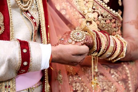 Bride & Groom Hand's Together in Indian Wedding