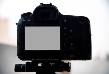 Camera on tripod Photographers take scenic views.の写真素材