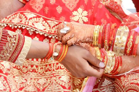 Indian couple playing Ring Fishing game in wedding ceremony of Indiaの写真素材