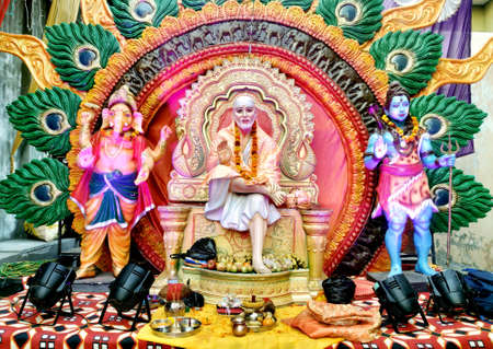 Indian Hindu God Shirdiwale Sai Baba Blessing Stone idol in Hindu Spiritual temple, Regarded by his...