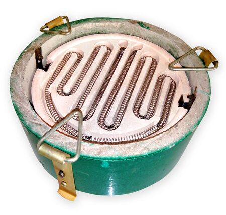 Heating element.Electric Heater coil Close up photo isolated in white backgroundの写真素材