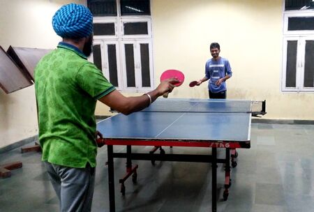 Rohtak, Haryana, India - 10 October, 2018:Two Friends Playing Tabletennis Conceptの写真素材