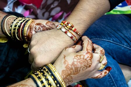 Rakshabandhan, celebrated in India as a festival denoting brother-sister love and relationship. Sister tie Rakhi as symbol of intense love for her brother.の写真素材